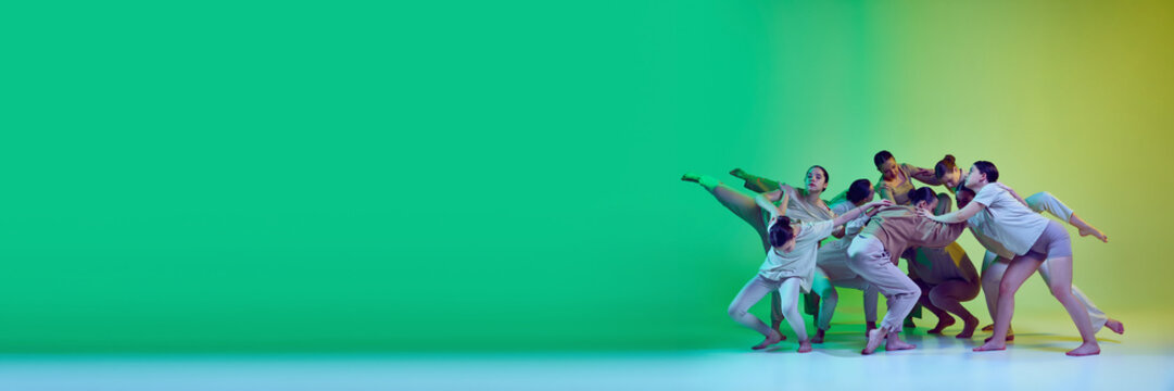 Banner with dance team of young adorable girls moving to the beat of the music on green gradient background in neon light. Copy space for ad, text - Powered by Adobe