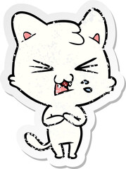 distressed sticker of a cartoon hissing cat