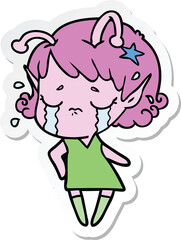 sticker of a cartoon crying alien girl