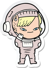 Obraz premium sticker of a cartoon astronaut woman