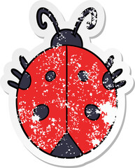 distressed sticker of a cartoon ladybug