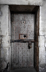 Fototapeta na wymiar old prison cell door