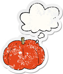 cartoon pumpkin with thought bubble as a distressed worn sticker