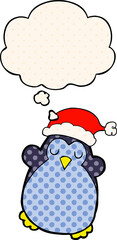 cute christmas penguin with thought bubble in comic book style