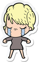 sticker of a cartoon woman crying