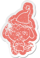 happy quirky cartoon distressed sticker of a dog wearing santa hat