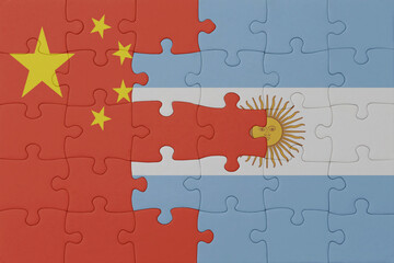 puzzle with the national flag of argentina and china . macro.concept.