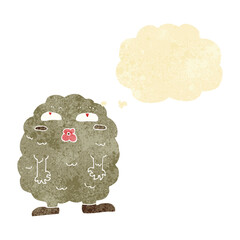 funny cartoon monster with thought bubble