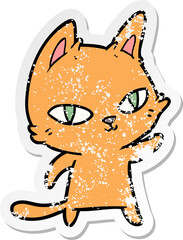 distressed sticker of a cartoon cat staring