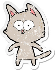 distressed sticker of a happy cartoon cat