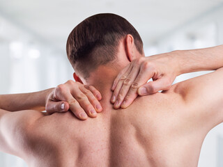 Pain in the cervical spine. Symptom of cervical chondrosis. Inflammation of the vertebrae in a man....