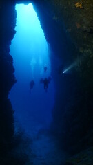 Fototapeta na wymiar cave diving underwater exploring caves with fish and having fun ocean scenery