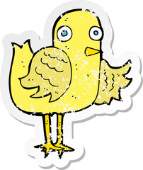 retro distressed sticker of a cartoon bird waving wing