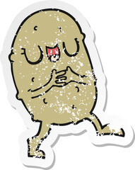distressed sticker of a cartoon happy potato
