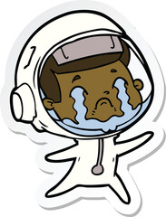 sticker of a cartoon crying astronaut