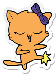 sticker of a cartoon cat with bow on head