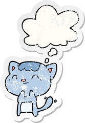 cartoon happy cat with thought bubble as a distressed worn sticker