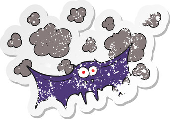 retro distressed sticker of a cartoon vampire bat