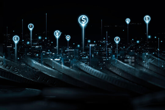 Double exposure of coins and city scape with currency sign include dollar euro pound sterling yen yuan won for technology currency exchange and money transfer, Financial banking investment concept.