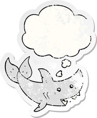 cartoon shark with thought bubble as a distressed worn sticker