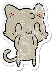 distressed sticker of a cartoon happy cat
