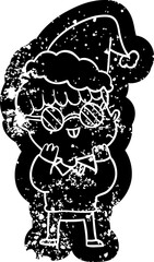 quirky cartoon distressed icon of a boy wearing spectacles wearing santa hat