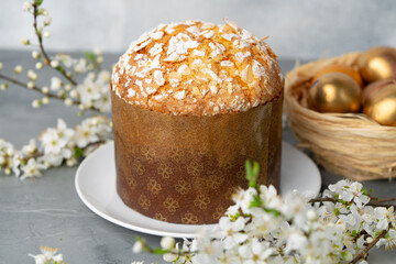 Easter cake with sugar powder on gray background