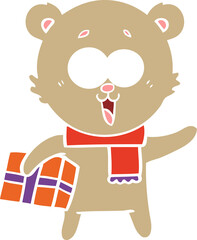 laughing teddy  bear with christmas present