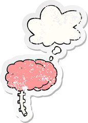 cartoon brain with thought bubble as a distressed worn sticker