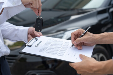 lease, rental car, sell, buy. Dealership manager send car keys to the new owner.  Sales, loan credit financial, rent vehicle, insurance,  renting, Seller, dealer, installment, car care business