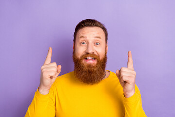 Photo of funny surprised man wear yellow shirt direct fingers novelty open new barber shop promo offer isolated on violet color background