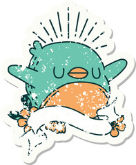 worn old sticker of a tattoo style flapping robin