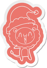 happy quirky cartoon  sticker of a lion wearing santa hat