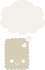 cartoon biscuit with thought bubble in retro style