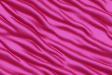 Texture of satin fabric of red, pink, purple color with folds. Satin material. Textile. Generative AI