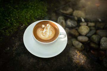 Background Coffee cup and beans on old kitchen table. Coffee cup in coffee shop.
