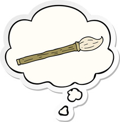 cartoon paint brush with thought bubble as a printed sticker