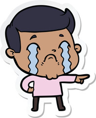 sticker of a cartoon man crying