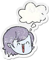 cartoon vampire girl face with thought bubble as a distressed worn sticker