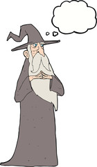 cartoon old wizard with thought bubble