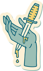 sticker of tattoo in traditional style of a dagger in the hand