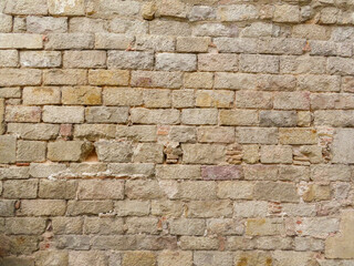 Textured stone sandstone surface. Close up image bricks