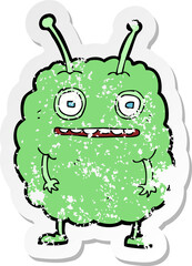 retro distressed sticker of a cartoon funny alien monster