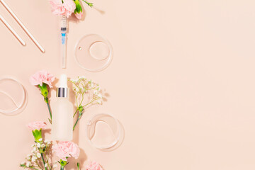 Concept of botox beauty injections. Syringe with toxin dropper bottle with serum and flowers on...