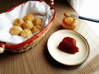 breakfast with romeo and juliet with cheese bread, guava paste and dulce de leche and wooden...