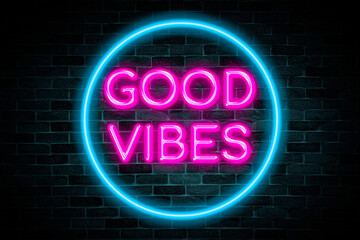 good vibes neon banner on brick wall background.