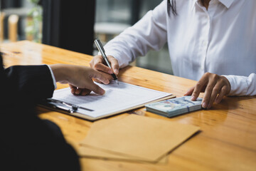 Paying or bribing the signing of an contract agreement. Illegal crime and dishonesty concepts.