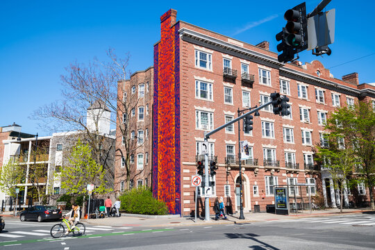 CAMBRIDGE, MASSACHUSETTS - APRIL 20, 2023: Life in Cambridge where all of the college students live, bike, walk, eat, and work around the region.