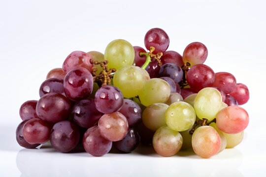 bunch of purple grapes on a white background from generative ai
