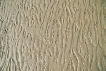 Waves on the beach, detail of a beach sand pattern texture,Natural background